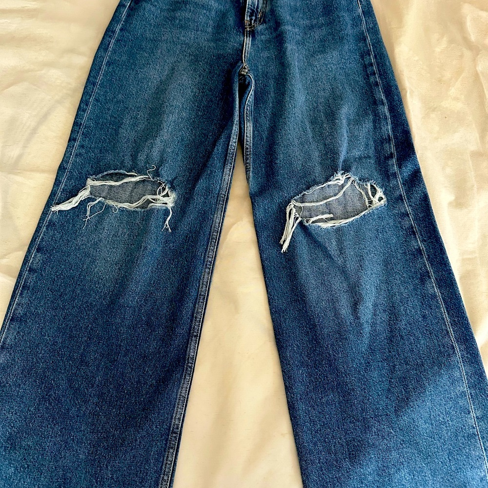 Levi’s wide leg with ripped knees